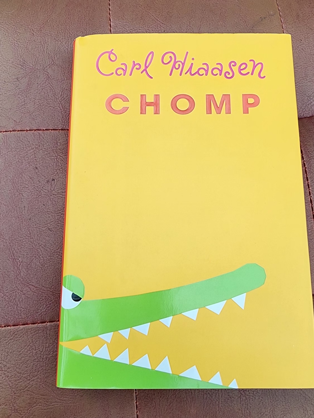 Carl Hiaasen CHOMP Hardcover - Yellow & Green